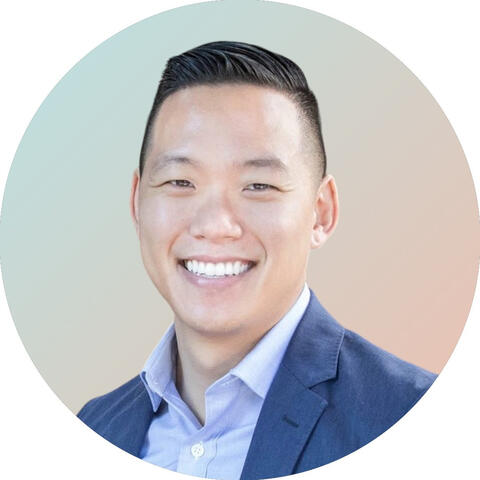 Asian male wearing blue suit